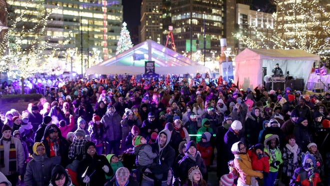 A large crowd of families gather before counting down the kiddie drop as part of last year's Motor City New Year's Eve-The Drop celebration at Campus Martius and Cadillac Square in downtown Detroit.
