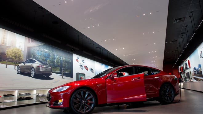 Tesla, Inc. selling electric cars in Arizona