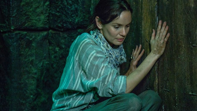 In "The Other Side of the Door," a  mother of a deceased son  (Sarah Wayne Callies) disobeys a sacred warning to never open the door at an ancient temple. 