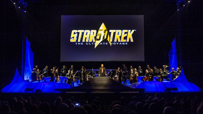 During "Ultimate Voyage," clips are projected above the orchestra on a 40-foot-wide screen, and the show features even  the failed 1965 "Star Trek" pilot, an episode titled "The Cage."