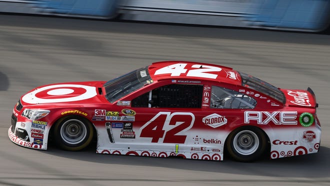 Sprint Cup Series driver Kyle Larson (42) races during the Pure Michigan 400 at the Michigan International Speedway. Aaron Doster-USA TODAY Sports