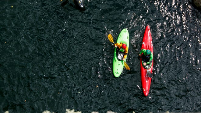 Should kayakers pay fees to use the river, just as people with motorized boats do?