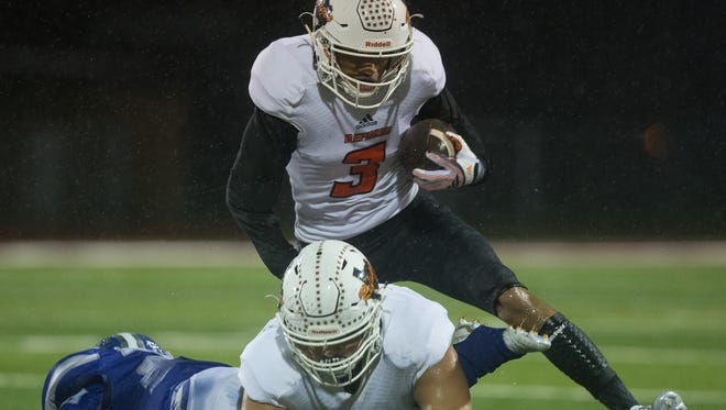 Refugio's Robert Ortiz runs the ball during the third quarter of a Class 2A Division I regional semifinal game against Ben Bolt Friday, Nov. 25 at Pirate Stadium in Mathis.