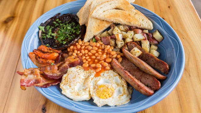 You can get a full English Breakfast at The Smith Cafe in Phoenix by ordering The Queen Mother: two cage-free eggs your way, Schreiner’s sausage link, English-style baked beans, bacon, house hash, grilled mushroom, roasted tomato and toast.