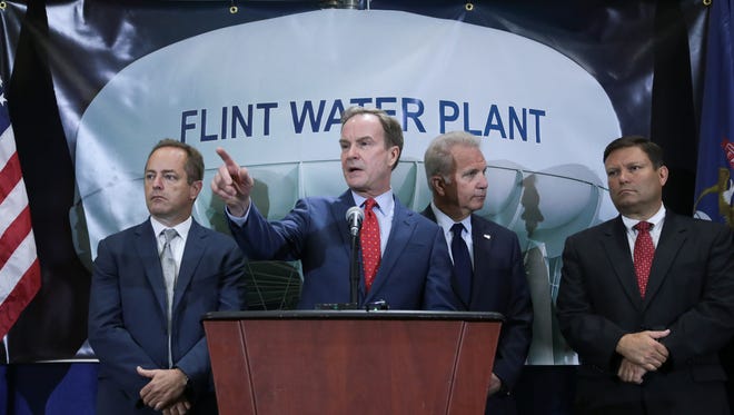 Attorney General Bill Schuette takes questions after announcing new charges against two high-ranking state health officials in the Flint drinking water crisis on Wednesday June 14, 2017.
