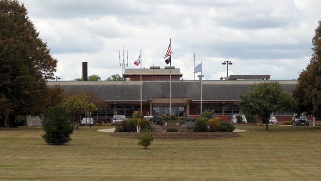 The front entrance of the Iowa Medical Classification Center, also known as Oakdale prison, is seen in this Sept. 6, 2017 file photo. In light of COVID-19, Iowa Department of Corrections staff is taking precautions to prevent the spread of the virus to the facility in March 2020.