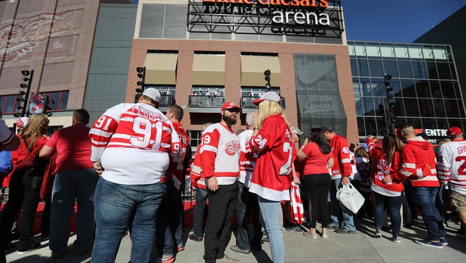 Fans arrive for the Detroit Red Wings game against the Minnesota Wild at Little Caesars Arena in Detroit Thursday, Oct. 5, 2017.