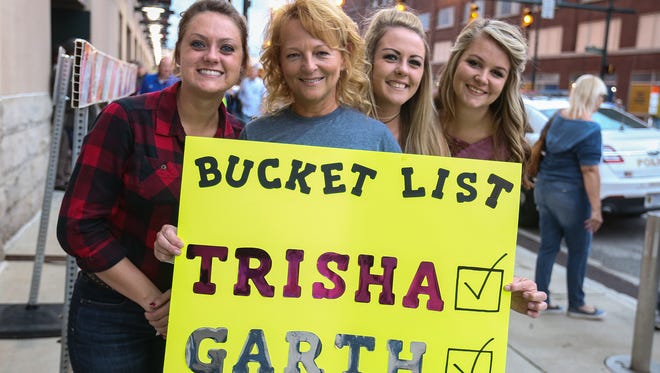 Fans of Garth Brooks pour in toward Banker's Life Fieldhouse for opening night of his four-day, five-concert stand in Indianapolis, Thursday, Oct. 5, 2017. 