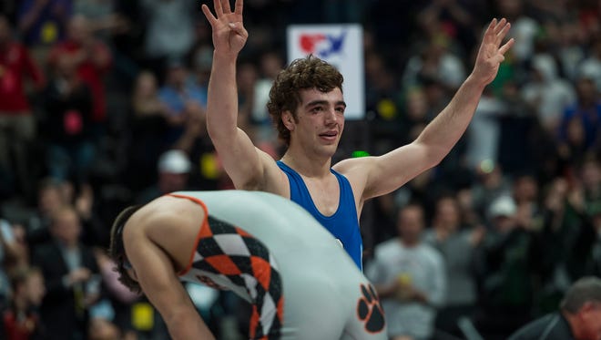 Poudre High School senior Jacob Greenwood celebrates after defeating Grand Junction senior Dylan Martinez to become a four-time state champion on Saturday, Feb. 17, 2018, during the Colorado State Wresting Championship at the Pepsi Center in Denver, Colo.