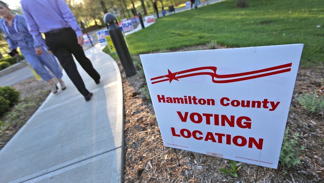 Voters come and go to vote at the Coxhall and Clay Center 1 voting site in Hamilton County, for the primary election, Tuesday, May 8, 2018.