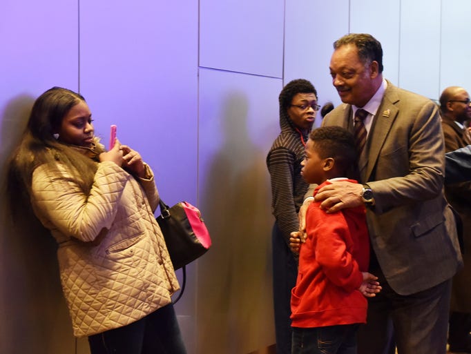 Heavyn Stewart takes a photo of Kenneth Patterson with