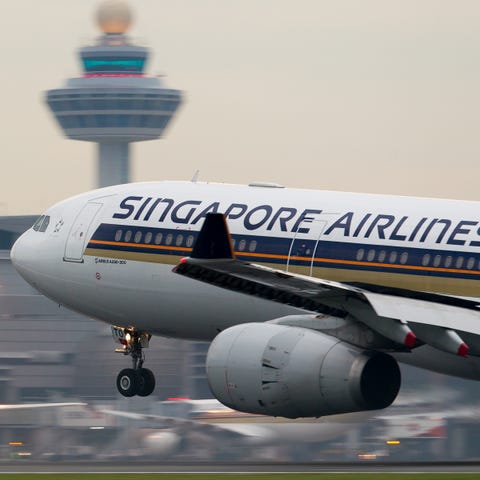 A Singapore Airlines Airbus A330 lands at...