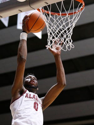 Alabama forward Donta Hall (0) scores abasing Tennessee during the second half of an NCAA college basketball game on Saturday, Feb. 10, 2018, in Tuscaloosa, Ala. Alabama won 78-50. (AP Photo/Brynn Anderson)