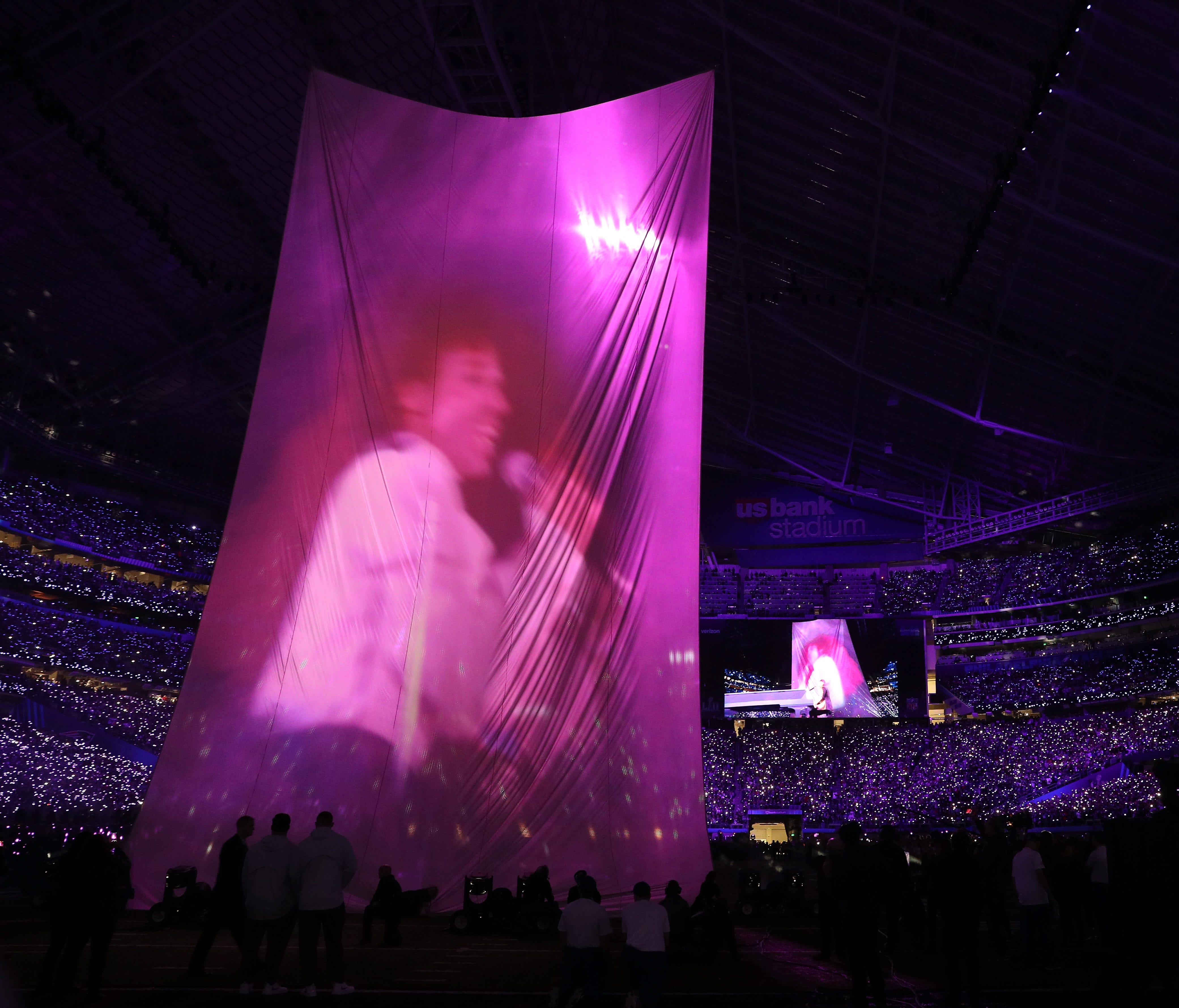 Justin Timberlake performs with Prince in the background during the Pepsi Super Bowl LII Halftime Show at U.S. Bank Stadium on Feb. 4, 2018, in Minneapolis.