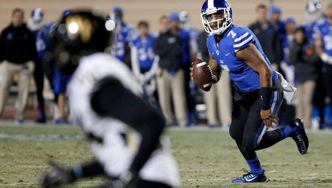Duke quarterback Anthony Boone (7) looks for a receiver against Wake Forest on Nov. 29 in Durham, N.C.