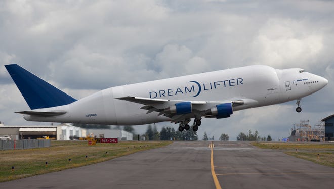 A Boeing Dreamlifter takes off from Paine Field in Everett, Wash., on Sept. 3, 2014.