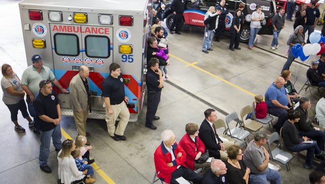 Attendees watch the dedication ceremony. Southern York County Emergency Medical Services holds a dedication ceremony and community kick-off celebration at the Airville Volunteer Fire Company to unveil its new ambulance service,  Oct. 25