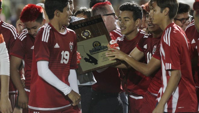 Desert Mirage High School, in red uniform, remained undefeated with a record of 23-0 after beating Shadow Hills High School during their CIF championship match at Rancho Mirage High School on March 4, 2016. Desert Mirage won 2-0.