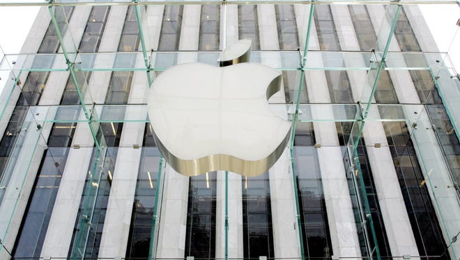 This file photo taken on June 26, 2007 shows the company logo at the Apple store  in New York.  Apple shares plunged in opening trade April 27, 2016 following disappointing earnings, sending US markets into the red. Apple, the world's largest company by market value, sank 7.2 after reporting its first-ever drop in iPhone sales in earnings released late April 26, 2016. Profits also fell in the fiscal second quarter, while revenues suffered their first quarterly drop since 2003.  / AFP PHOTO / DON EMMERTDON EMMERT/AFP/Getty Images ORIG FILE ID: 551351790