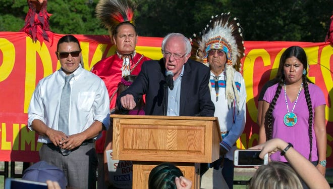 Sen. Bernie Sanders, I-Vt., speaks to protesters who oppose the Dakota Access pipeline during a rally across the street from the White House on Sept. 13, 2016.