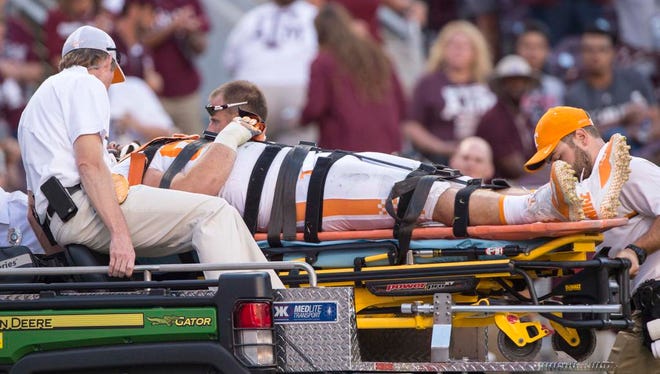 Tennessee Volunteers defensive lineman Danny O'Brien (95) is carted off during the second half against the Texas A&M Aggies at Kyle Field. The Aggies defeat the Volunteers 45-38 in overtime.