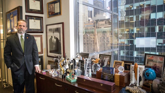 Trump Hotels CEO Eric Danziger poses for a portrait in his office at Trump Tower in New York. The Trumps are launching a new hotel chain in a bold expansion of a company that critics say is already too big and opaque for an owner who sits in the Oval Office. Called Scion, the aim is to open dozens in the next three years.