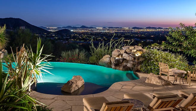 Peter Werth Jr., CEO of Chemwerth Inc., paid cash for this 7,200-square-foot contemporary-style mansion in north Scottsdale's Troon Canyon community.