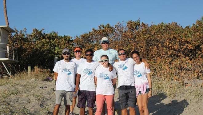 Event Sponsor MetCo – Marine Electronics of the Treasure Coast – volunteers gather to take part of the International Coastal Cleanup.

Front: Kevin Flis, Michael Rahaman, Stephanie Rahaman, Connor Fenno, Jamie Murray

Back:  MetCo owner, Mark Palazzo with wife Sheila Palazzo