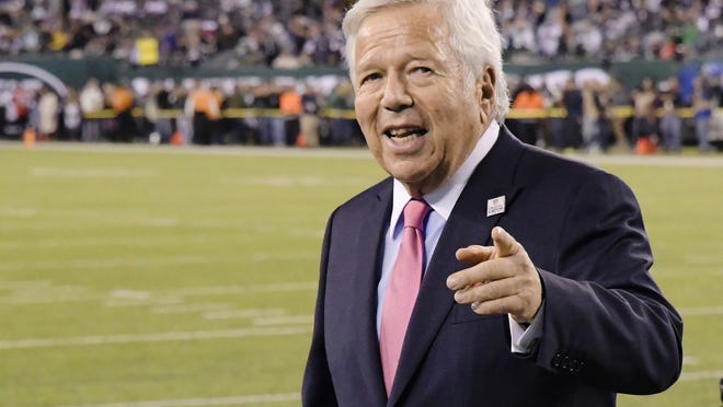 FILE - In this Oct. 21, 2019, file photo, New England Patriots owner Robert Kraft points to fans as his team warms up before an NFL football game against the New York Jets, in East Rutherford, N.J. A Florida appeals court ruled Wednesday, Aug. 19, 2020, that police violated the rights of New England Patriots owner Robert Kraft and others when they secretly video recorded them paying for massage parlor sex acts, barring the tapes' use at trial and dealing a potentially deadly blow to their prosecution.