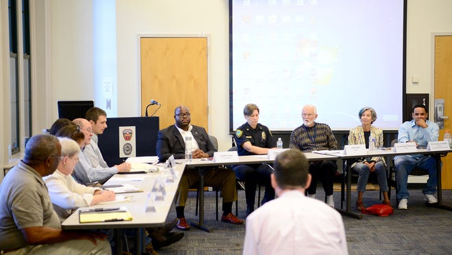 The Citizen Police Advisory Committee meets at the Asheville Police Department on Wednesday, Oct. 5, 2016. The committee consists of 12 members including a city council member, the police chief, five area representatives, a police officer, a public housing resident, a Housing Authority representative and two at-large seats. 