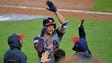 Giancarlo Stanton of the USA is congratulated after