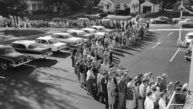Crowds of shoppers lined up outside of 1904 Elmwood Avenue to get a peak at the inside of the new Pay Less super market. Photo taken Sept. 13, 1960.