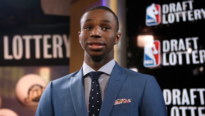 Top NBA draft prospect Andrew Wiggins of Kansas prepares for an interview during the NBA draft lottery in New York, May 20, 2014.