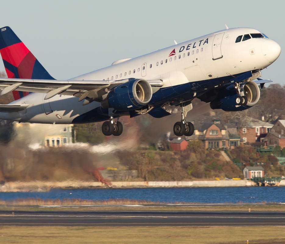 A Delta Air Lines Airbus A319 departs Boston Logan International Airport on Nov. 25, 2017.