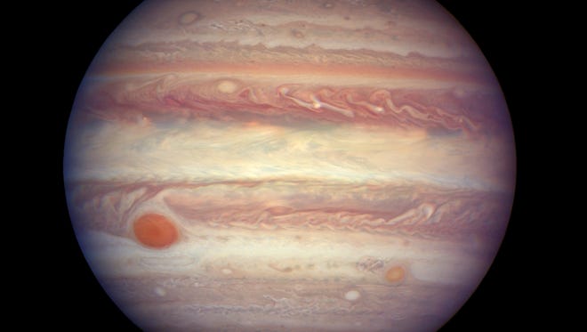 A team of astronomers is reporting the recent discovery of a dozen new moons circling the giant gas planet of Jupiter. That brings the number of moons at Jupiter to 79, the most of any planet.