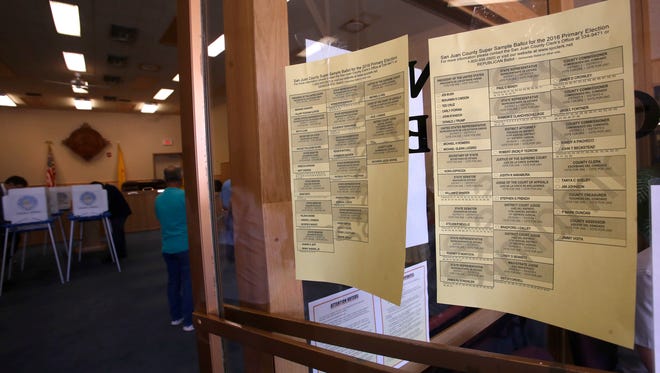 Sample ballots are posted Tuesday at Farmington City Hall.