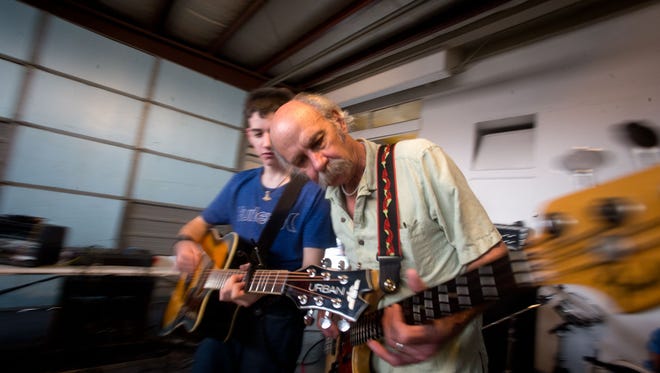 Jim Kuzma, a teacher at C.V. Koogler Middle School, rehearses with guitarist Zac Fleming and the Imagine Band on Feb. 6, 2017. The group is now based out of the new Aztec Theater Center for Music & the Arts.