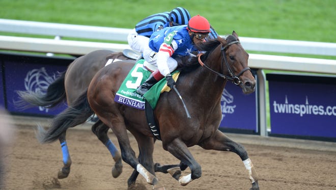 Runhappy with Edgar Prado wins the Sprint during the Breeders' Cup World Championships at Keeneland Race Course in Lexington, Ky., on Saturday, October 31, 2015. Photo by Mike Weaver