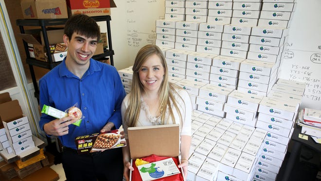Eli Zauner and Monique Bernstein are the owners of Universal Yums!, a business they started in October, putting together boxes of treats from around the world and sending them out to subscribers. The boxes contain snacks from different countries such as China and Brazil.