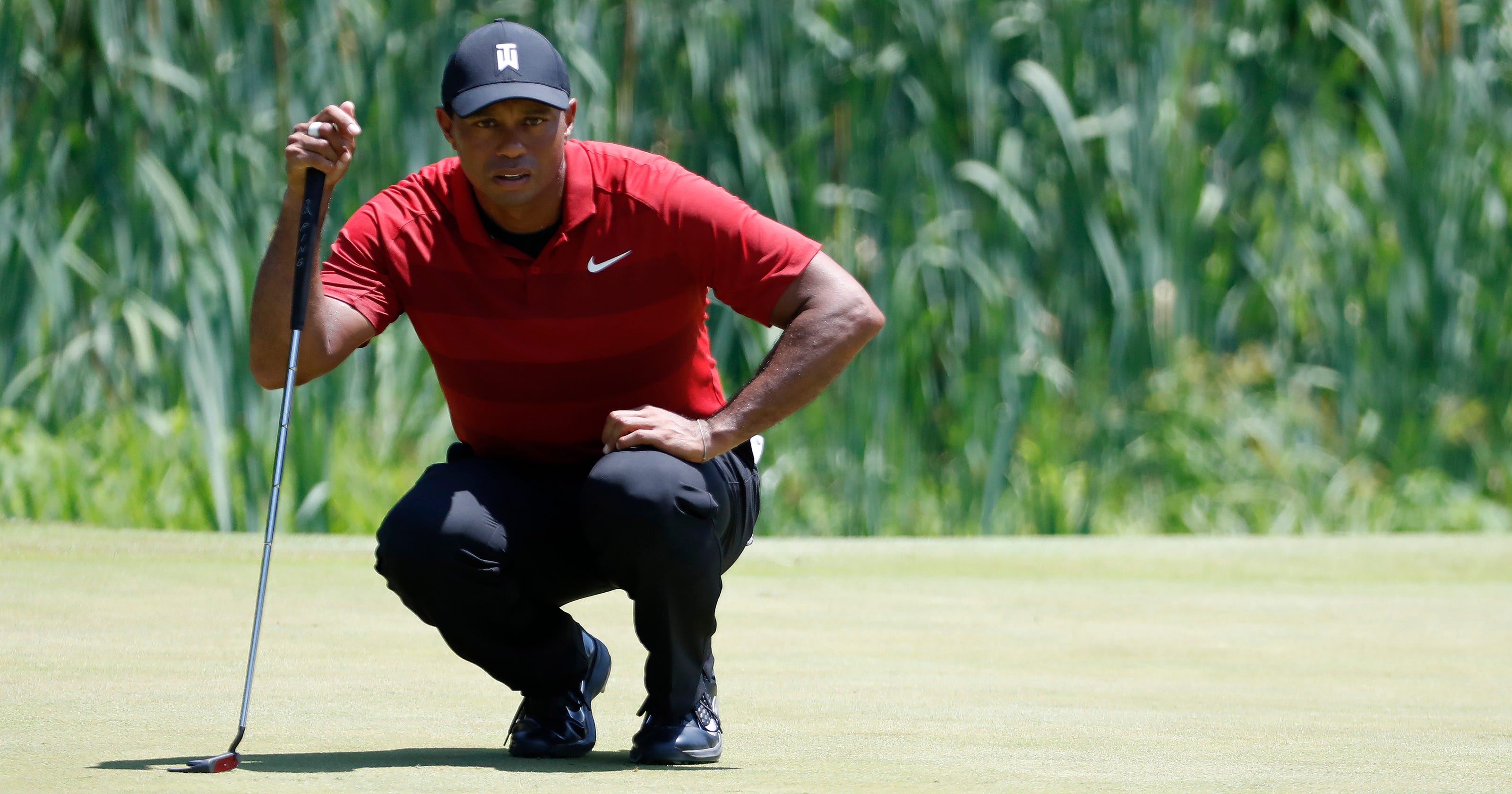 Tiger Woods makes silly mistakes after charging leaderboard at National