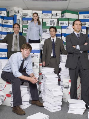 John Krasinski, from left, Rainn Wilson, Jenna Fischer, B.J. Novak and Steve Carell in NBC's "The Office." An episode of "The Office" has been edited to remove a scene featuring a character in blackface.