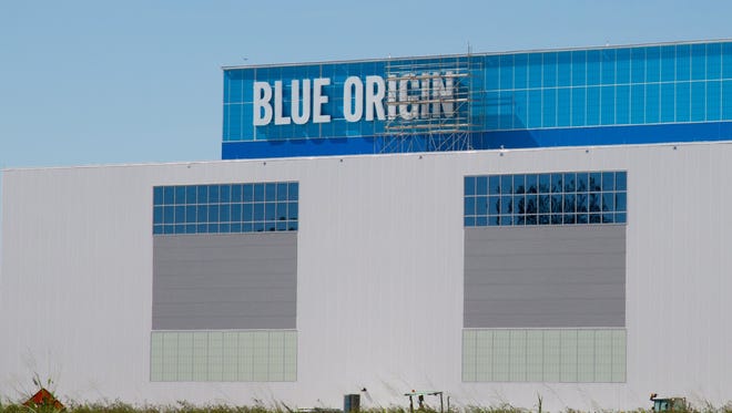 Blue Origin's logo is seen on its New Glenn factory at Kennedy Space Center's Exploration Park in October 2017.