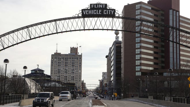 A view of Saginaw Street leading into downtown Flint in early January, 2016.