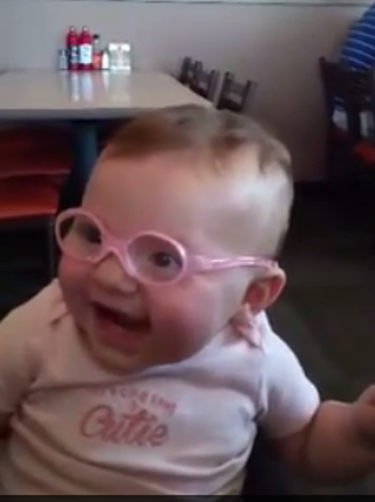 Baby's amazement at getting glasses goes viral