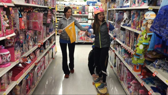 Team Knights of Questeros Longboard in Walmart during the Cotopaxi Questival on November 7, 2015.