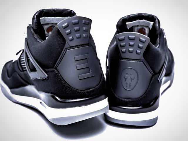 Rare Eminem Nike Air Jordan 4 kicks up for