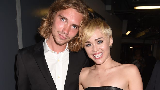 My Friend's Place representative Jesse and Miley Cyrus attend the 2014 MTV Video Music Awards at The Forum on August 24 in Inglewood, Calif.