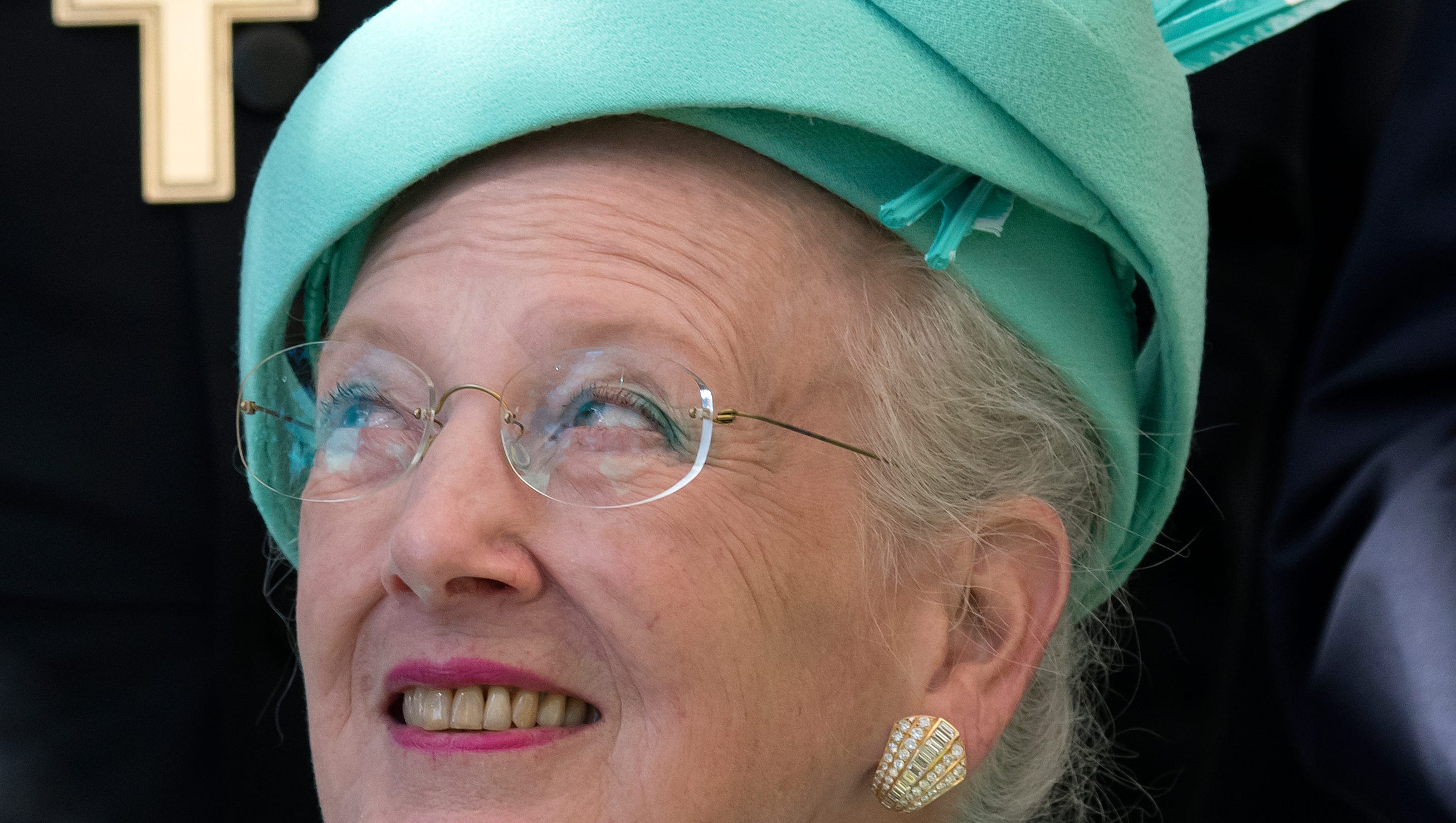 Denmark's queen strips grandchildren of royal titles, says sorry