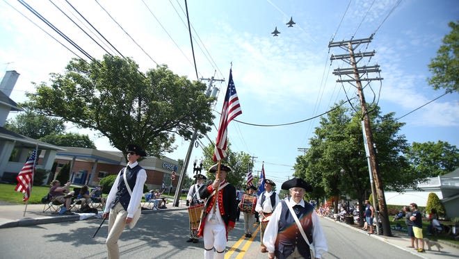 An F-16 flyover made its way down Speedwell Avenue in Morris Plains during the 30th annual Memorial Day parade and service.  May 28, 2016, Morris Plains, NJ