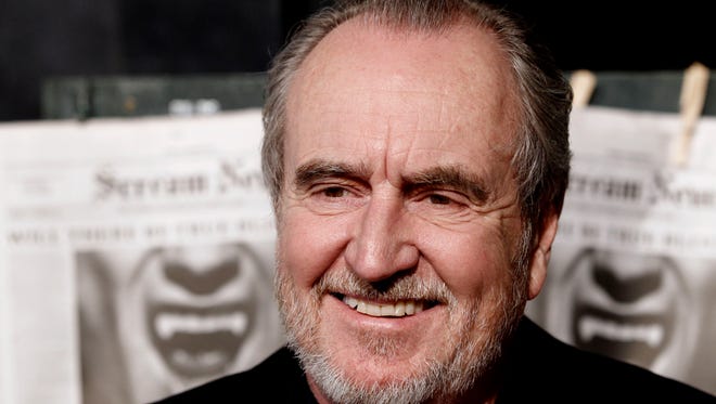 Wes Craven arrives at the Scream Awards on Oct. 16, 2010, in Los Angeles. The horror filmmaker died Sunday of brain cancer.
